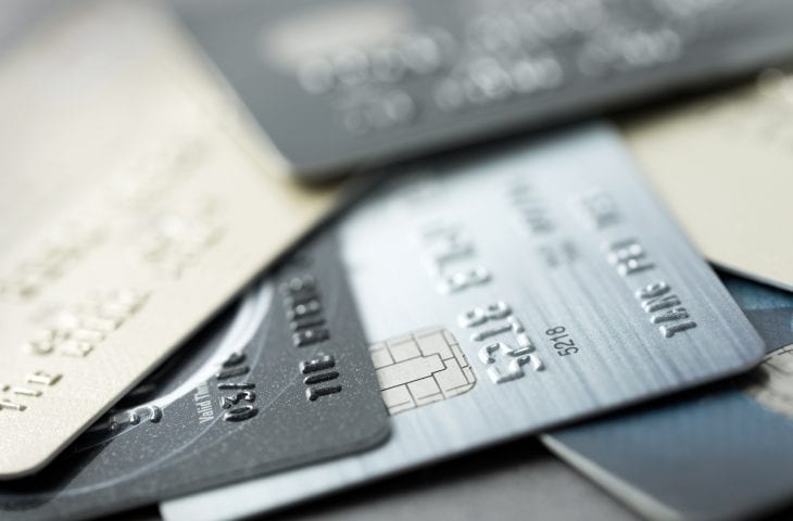 Close up of credit cards forming background